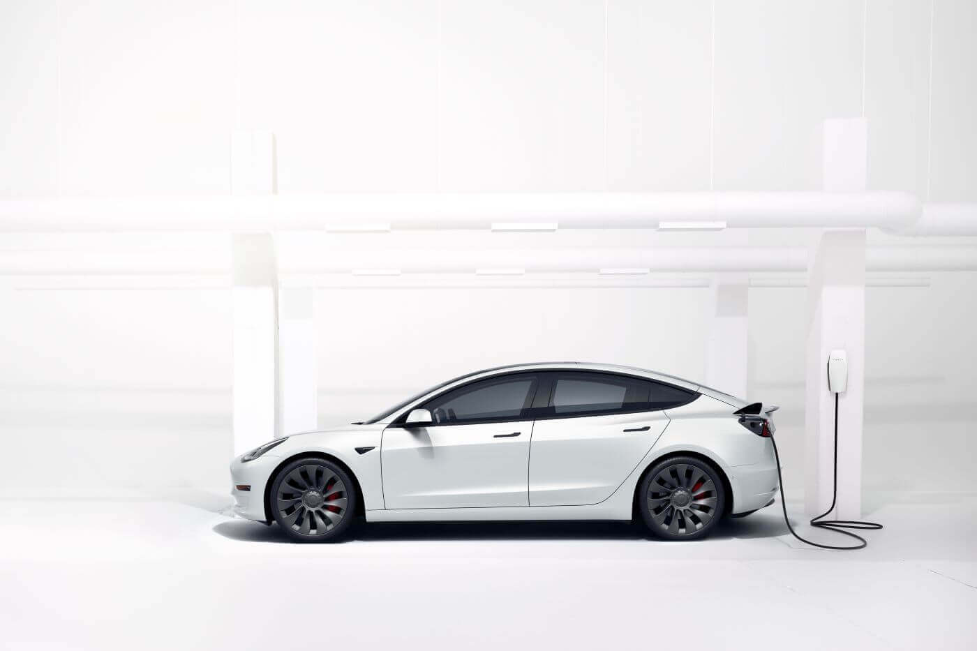White Tesla Model 3 charging