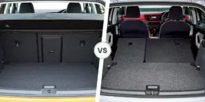 A comparison of the cargo areas of a Volkswagen Golf and a Volkswagen Polo. The left side shows the cargo area of the Volkswagen Golf, with the rear seats folded down to reveal a flat loading floor. The right side shows the cargo area of the Volkswagen Polo, also with the rear seats folded down to reveal a flat loading floor. The two cargo areas are separated by the word "VS.