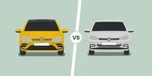 A comparison of a yellow Volkswagen Polo GTI and a white Volkswagen Golf. The Volkswagen Polo GTI is on the left side, and the Volkswagen Golf is on the right side. The two cars are separated by the word "VS.