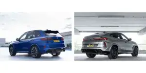 A side-by-side comparison of two BMW SUVs. On the left is a blue BMW X5 M, and on the right is a silver BMW X6 M. Both cars have a sporty design with large alloy wheels, aggressive rear bumpers, and quad exhaust tips.