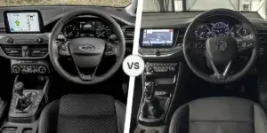 A side-by-side comparison of the interiors of two cars. On the left is the interior of a Ford Focus, featuring a large touchscreen display and a digital instrument cluster. On the right is the interior of a Volkswagen Polo, featuring a smaller touchscreen display and analog gauges. Both interiors have black dashboards and steering wheels.