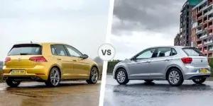 A comparison of a yellow Volkswagen Golf and a silver Volkswagen Polo. The Volkswagen Golf is on the left side, and the Volkswagen Polo is on the right side. The two cars are separated by the word "VS.