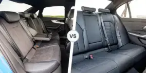 A side-by-side comparison of the rear seats of two cars. On the left is the rear seat of an Audi A4, showing a spacious interior with headrests, armrests, and a center console with cupholders. On the right is the rear seat of a BMW 3 Series, also showing a spacious interior with headrests, armrests, and a center console with cupholders.