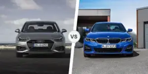 A side-by-side comparison of two cars. On the left is a gray Audi A4 sedan, and on the right is a blue BMW 3 Series sedan. Both cars are parked in different locations with scenic backgrounds. The license plate on the Audi A4 is IN A 4251, and the license plate on the BMW 3 Series is MSY 5173.