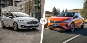 A side-by-side comparison of two cars. On the left is a white Ford Fiesta parked on a city street in front of a building. The license plate on the car is EX18 WOH. On the right is an orange Vauxhall Corsa driving on a road with a scenic landscape in the background. The license plate on the car is BN69 CWD.